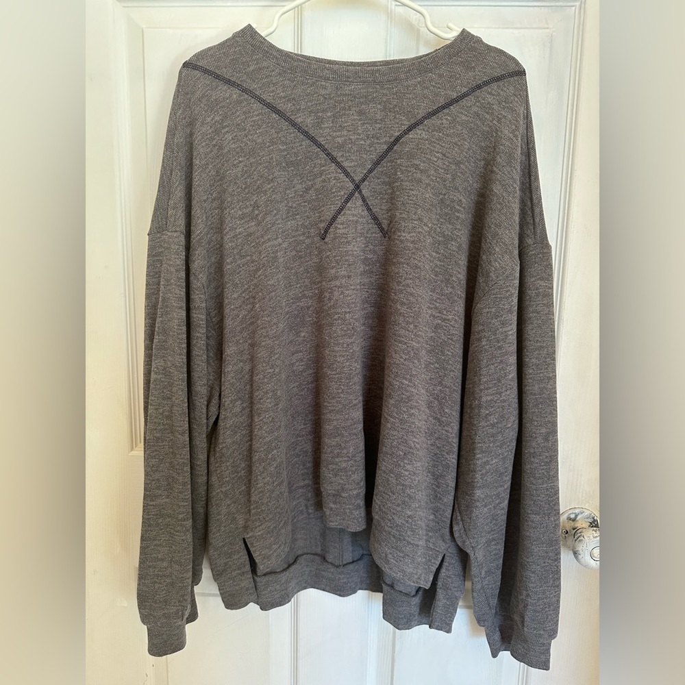 Women’s drop shoulder top. Cute detailing navy blue stitching, oversized